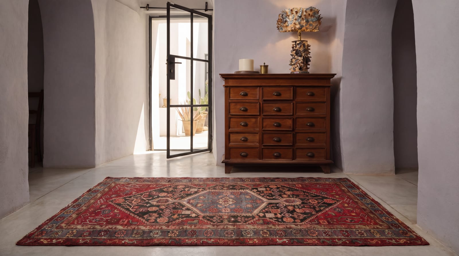 Tribal rug with rich natural dye colours — indigo, madder, and walnut