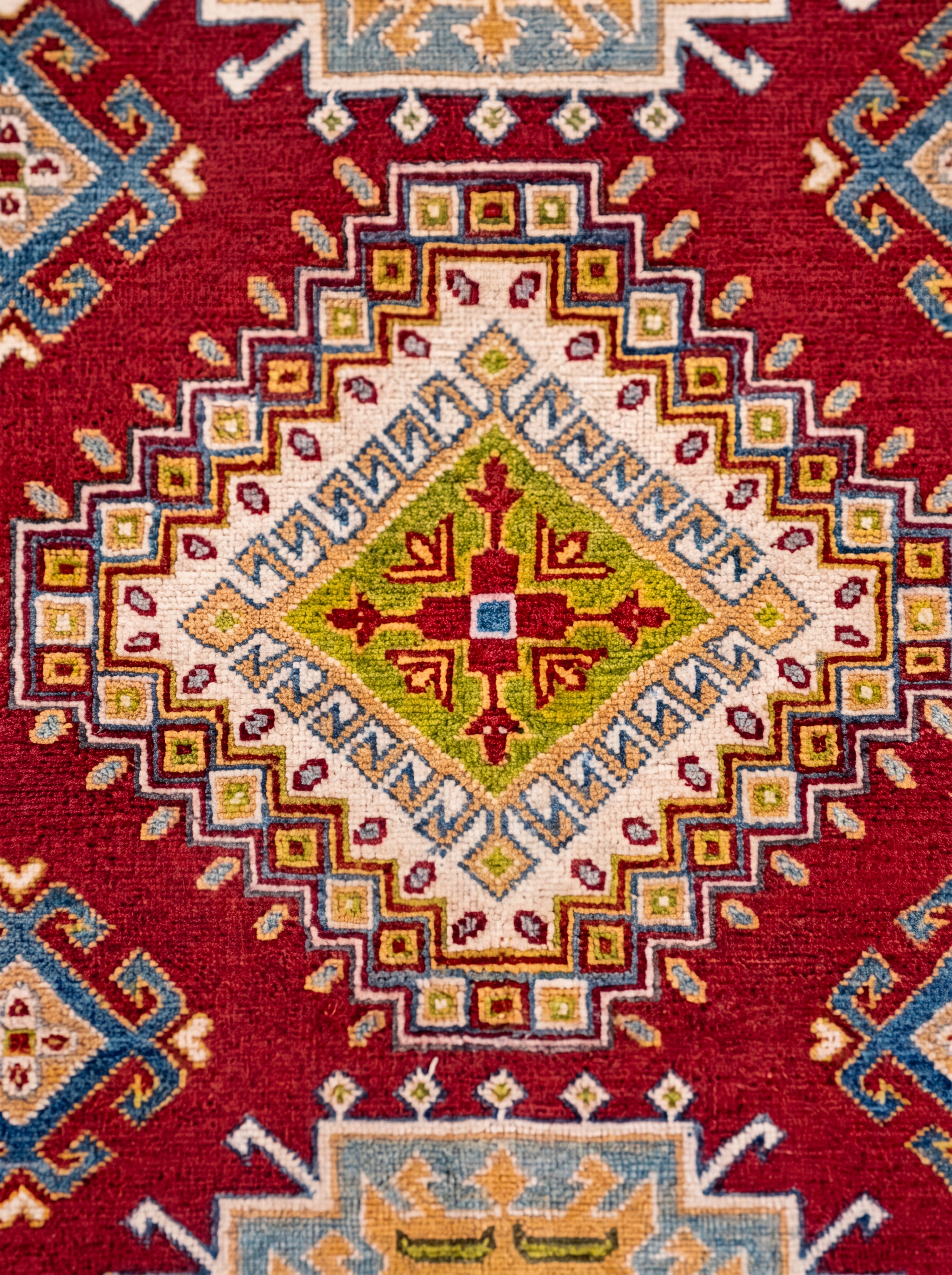 Kazakh Tribal Medallion Red, Kazakh, Afghanistan tribal rug, in madder red, Wool, 175 × 117 cm (5'9" × 3'10"), Nasim Carpets Malaysia — view 3