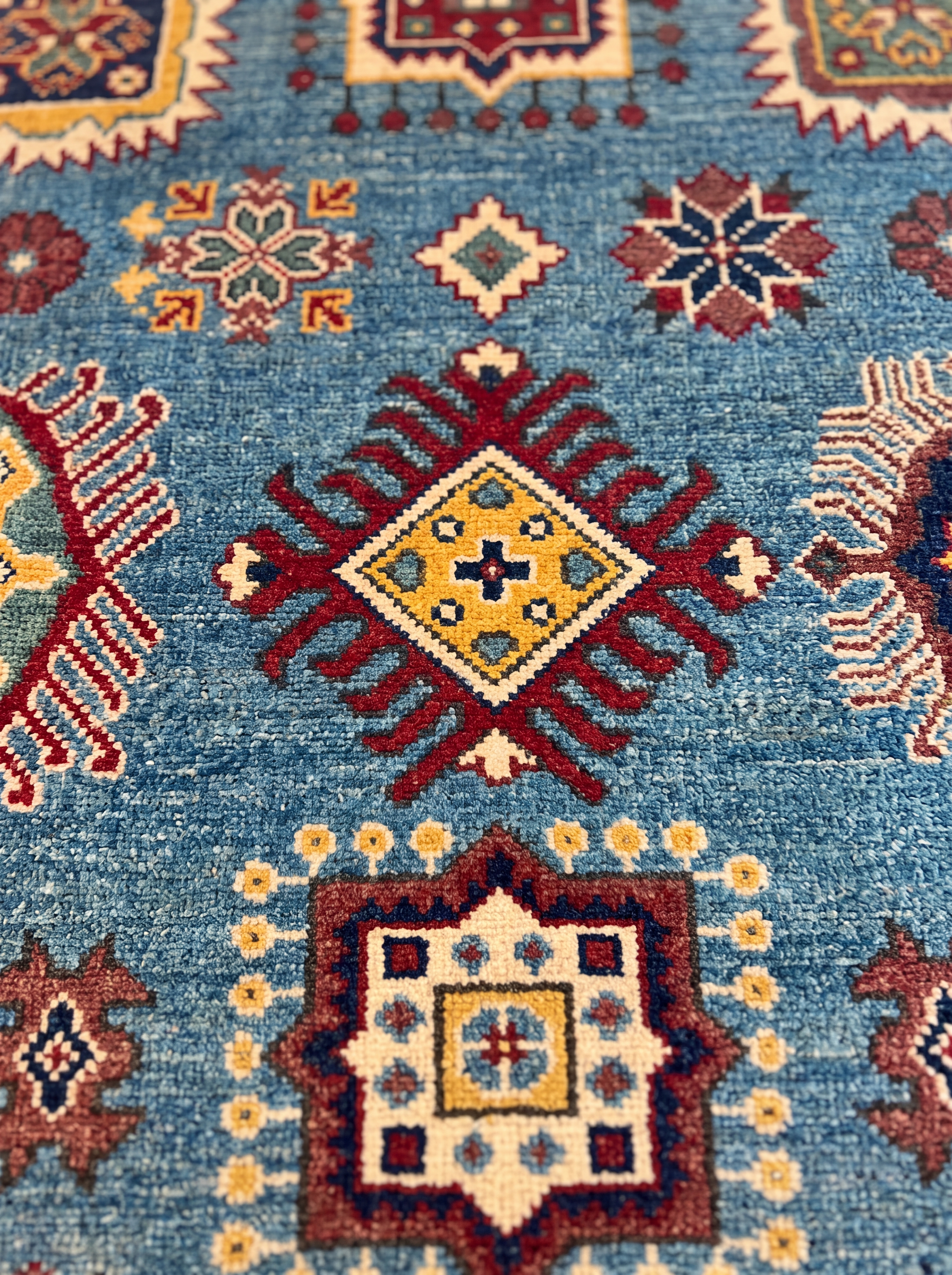 Kazakh Compartmental Sky Blue, Afghan Kazakh (Northwest Afghanistan, Kunduz region) tribal rug, in steel blue, Wool, 152 × 213 cm (5'0" × 7'0"), Nasim Carpets Malaysia — view 3